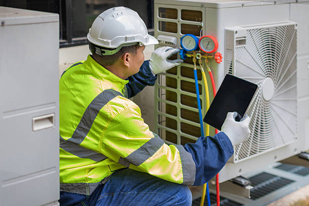 Professional Air Conditioning Repair technician working in Mashpee, MA